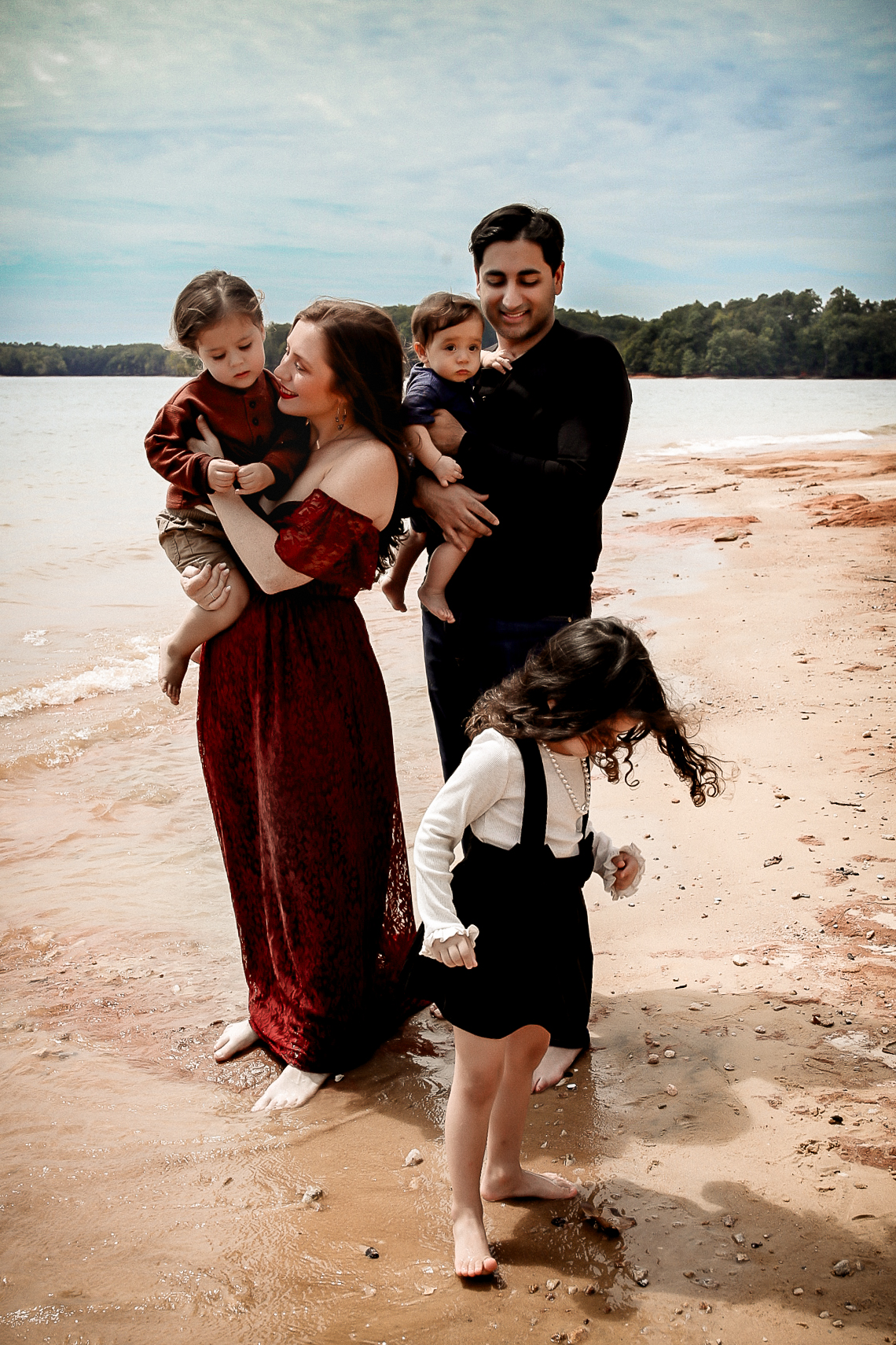 Family of 5 in the sand at lake Lanier Atlanta